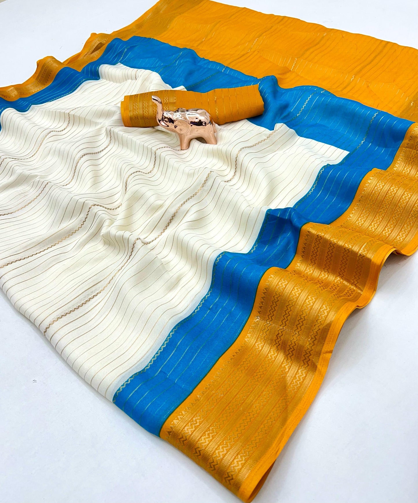 Soft Marshmallow Fabric Saree with All-Over Padded Print & Matching Blouse – Lightweight & Elegant Daily Wear | Swaraas.in