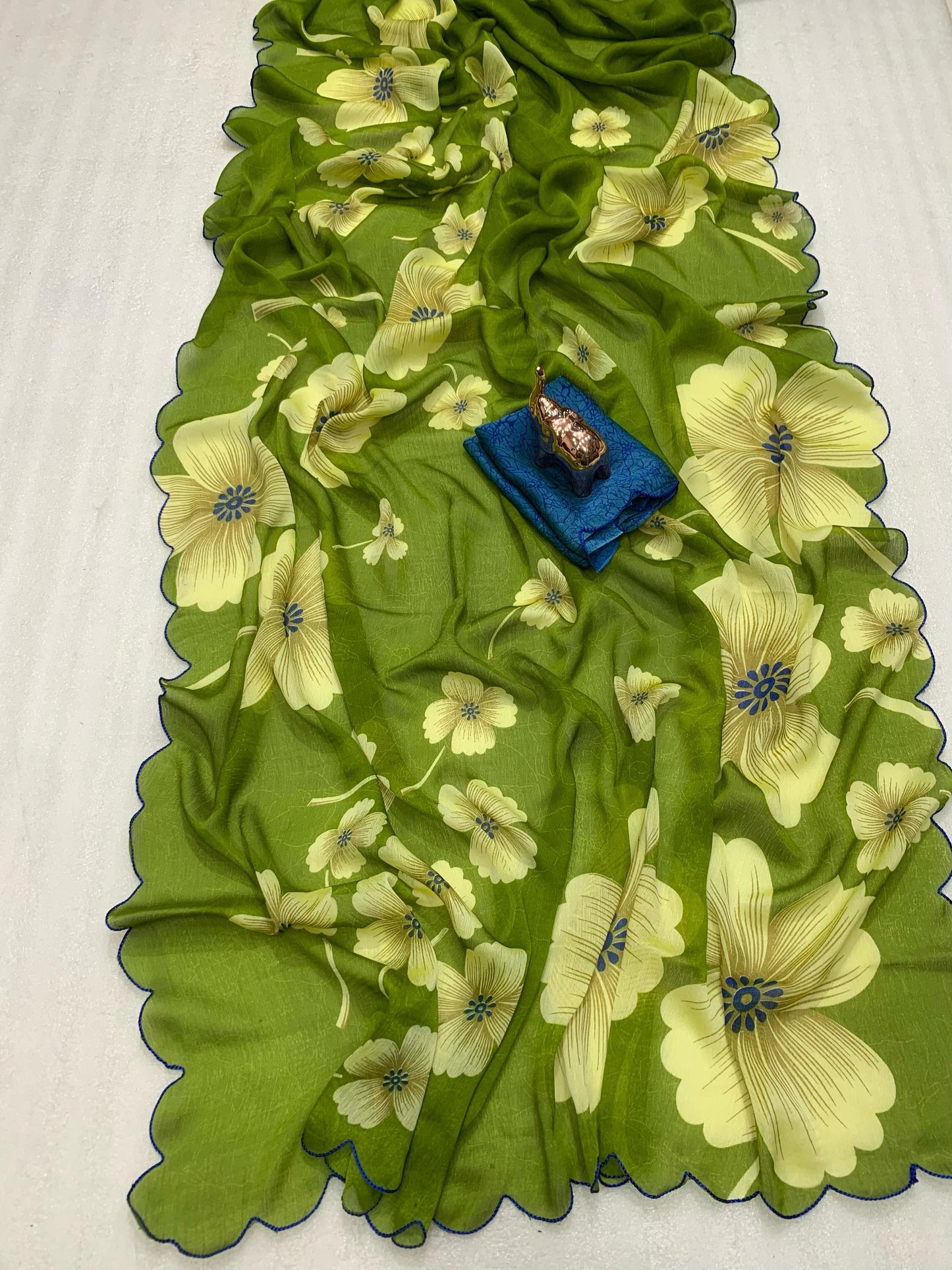 Blooming Summer Floral Georgette Saree with Mina Color Cutwork Border – Lightweight Bollywood Style Saree | Swaraas.in
