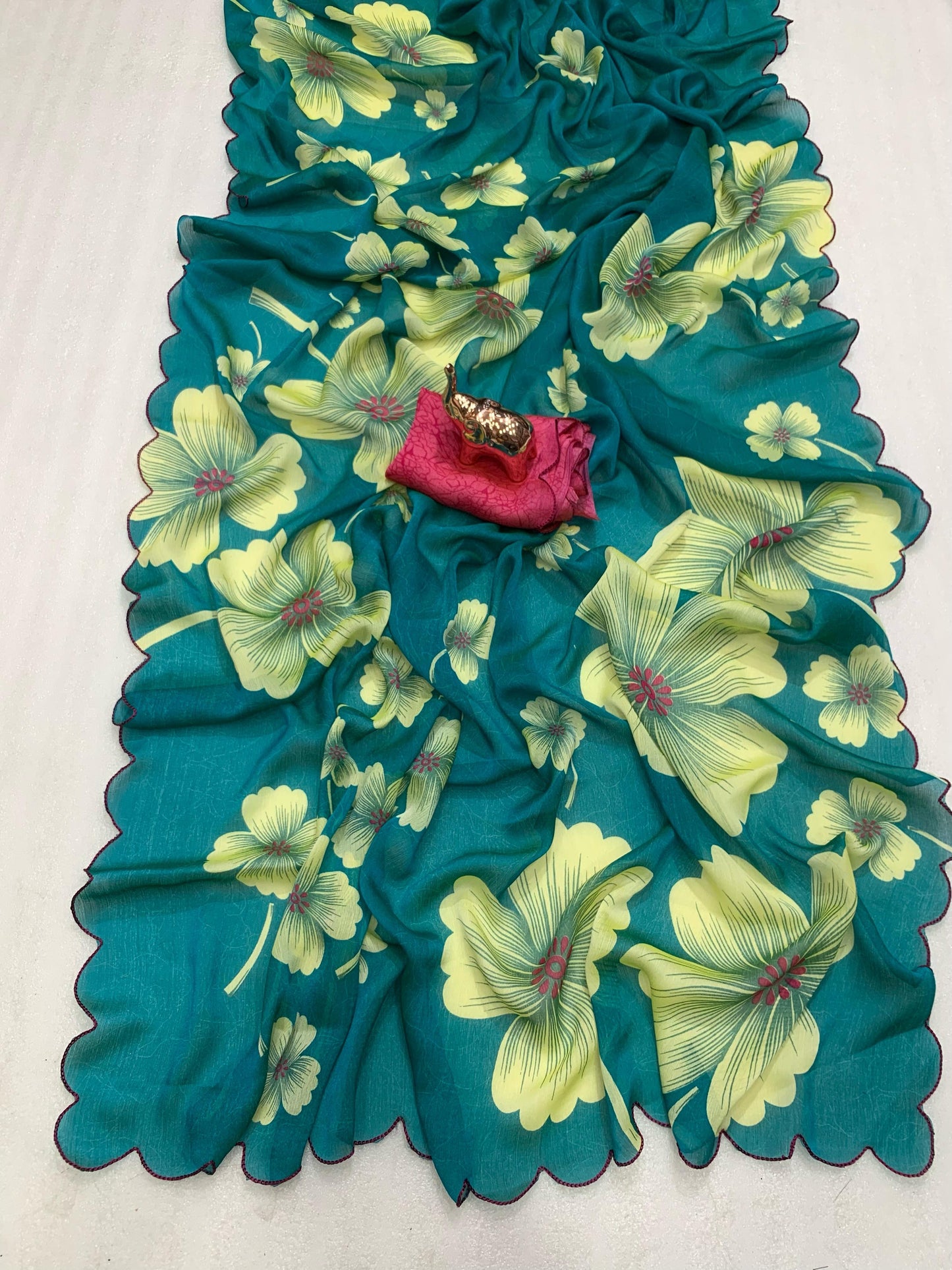 Blooming Summer Floral Georgette Saree with Mina Color Cutwork Border – Lightweight Bollywood Style Saree | Swaraas.in