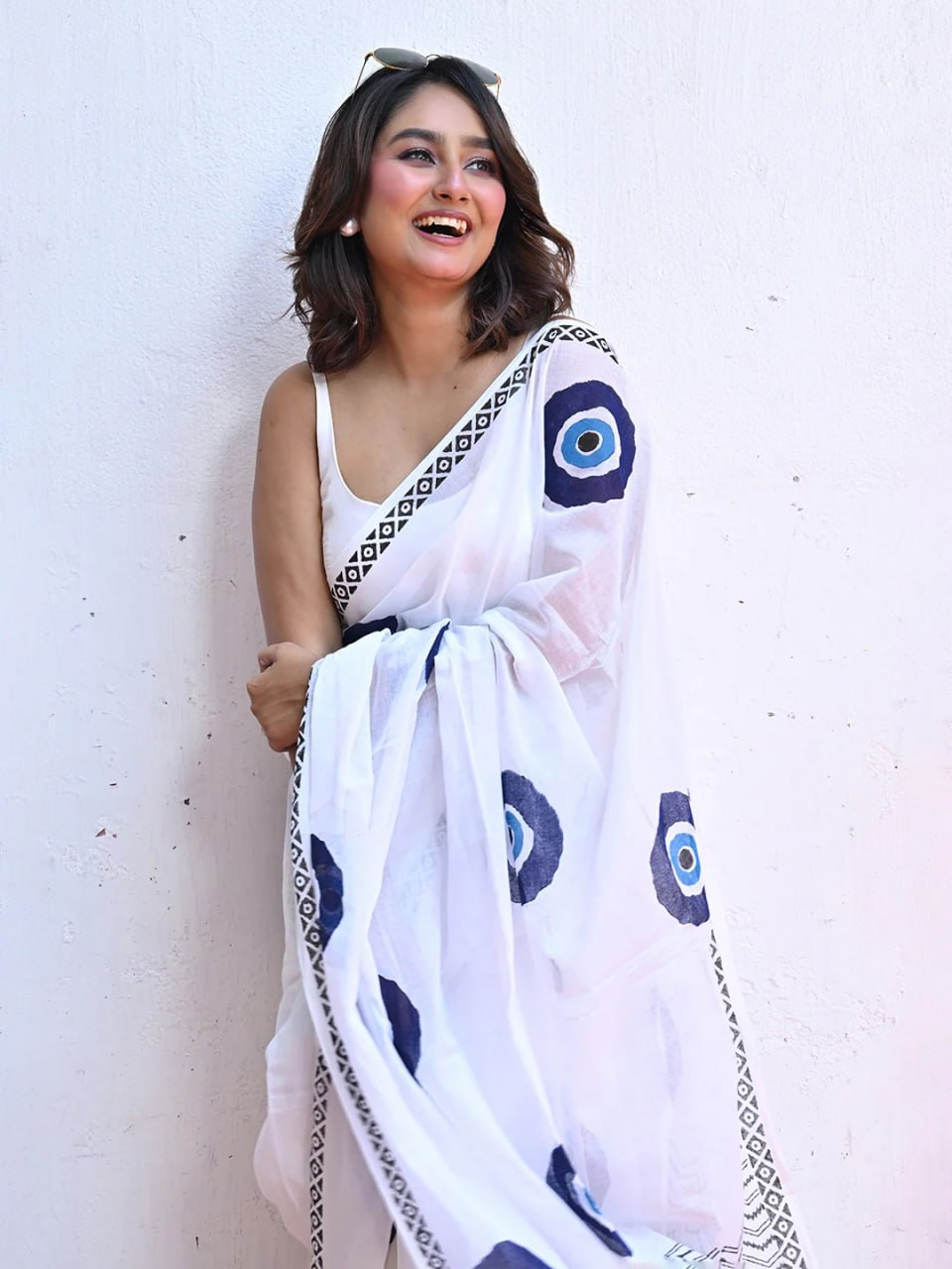White Linen Saree with Blue Evil Eye Motifs, Geometric Border and Chevron Pallu with Running Blouse for Office Wear