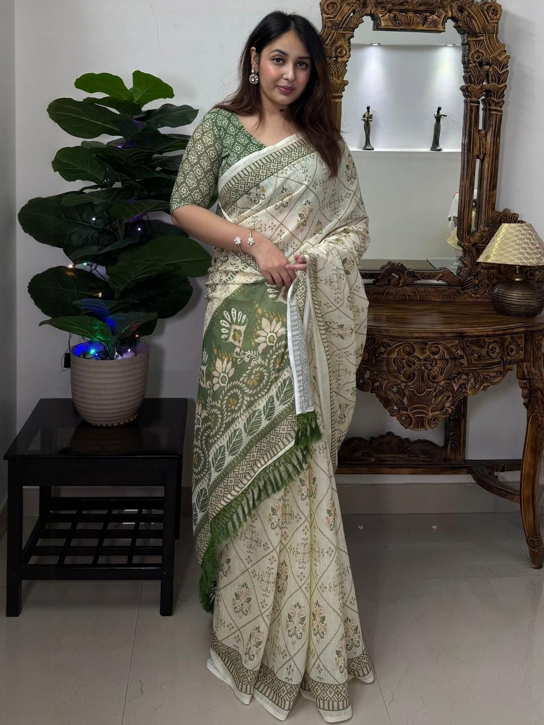 Cream and olive green linen block print saree - side profile