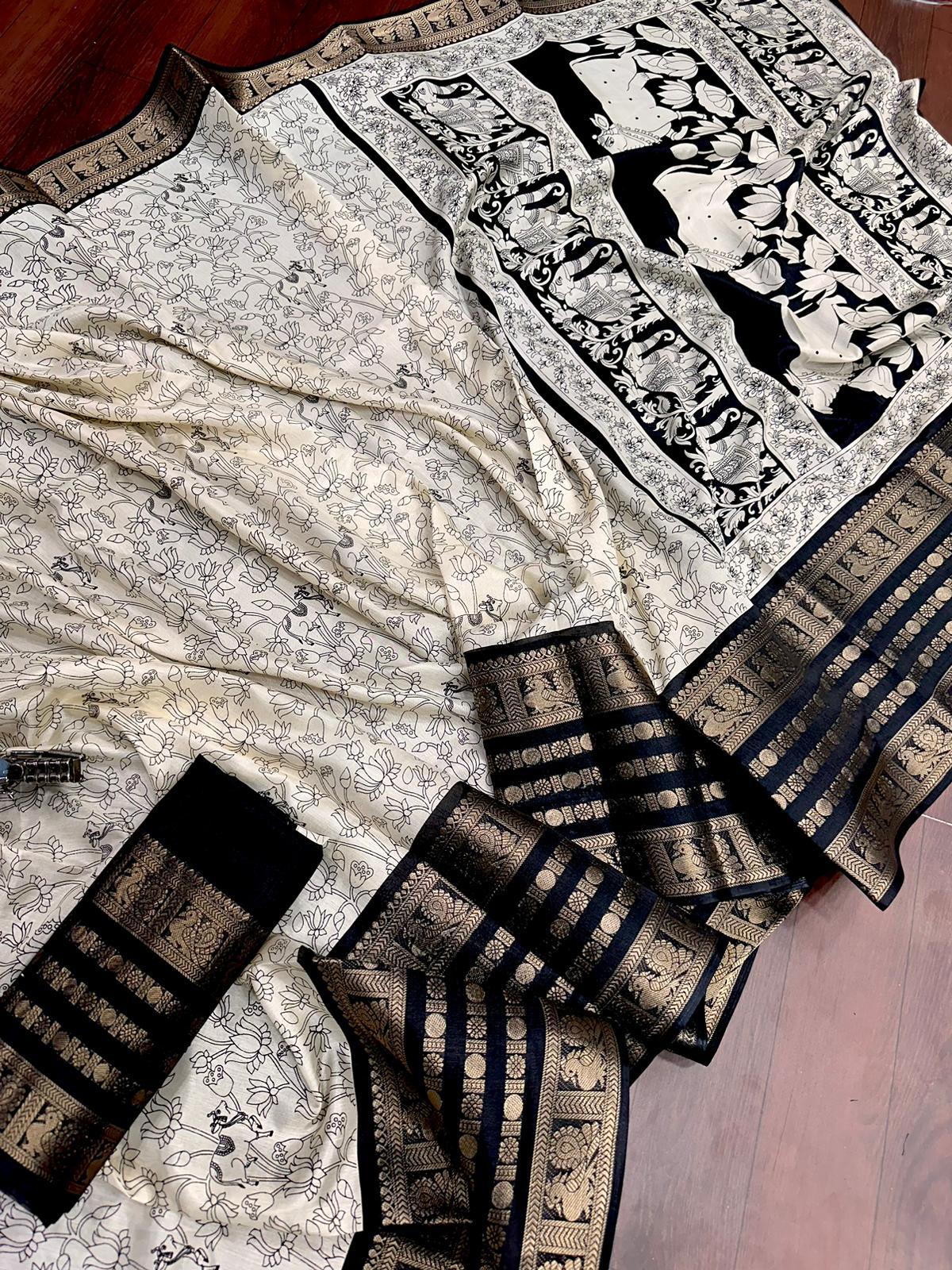 Heavy butter dola silk fabric with golden Dolby jacquard border and discharge padding leaf print - Swaraas