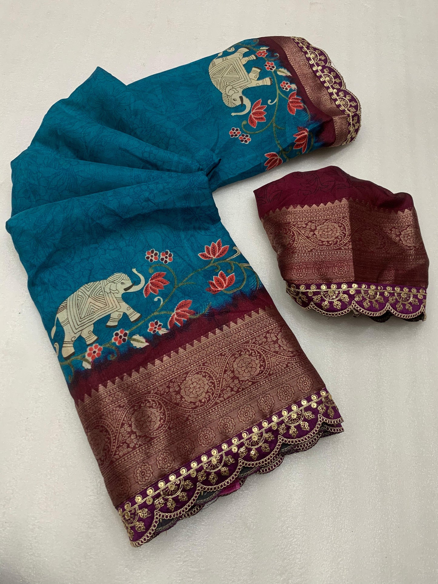 Beautiful Benny crape saree with all over kalamkari design along with scallop maggam work lace at border - Swaraas