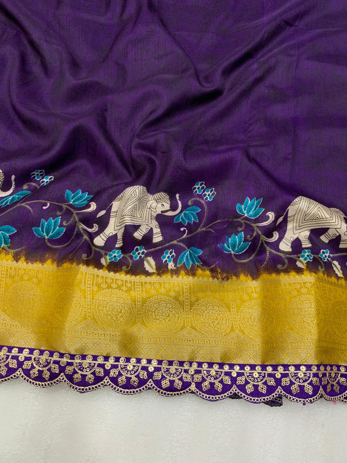 Beautiful Benny crape saree with all over kalamkari design along with scallop maggam work lace at border - Swaraas