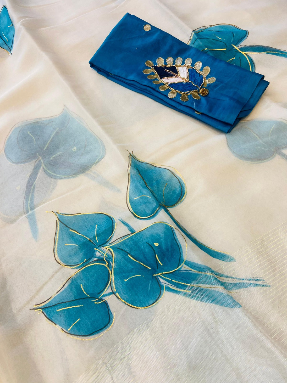 Soft organza saree with fflower print and lining border all over  - Swaraas