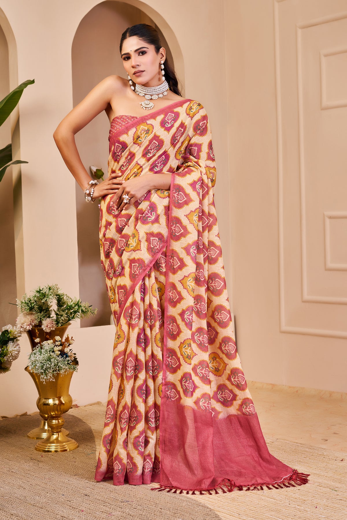 Cream and Rose Pink Tissue Silk Saree with Floral Motifs, Tasselled Pallu and Running Blouse for Festive Wear