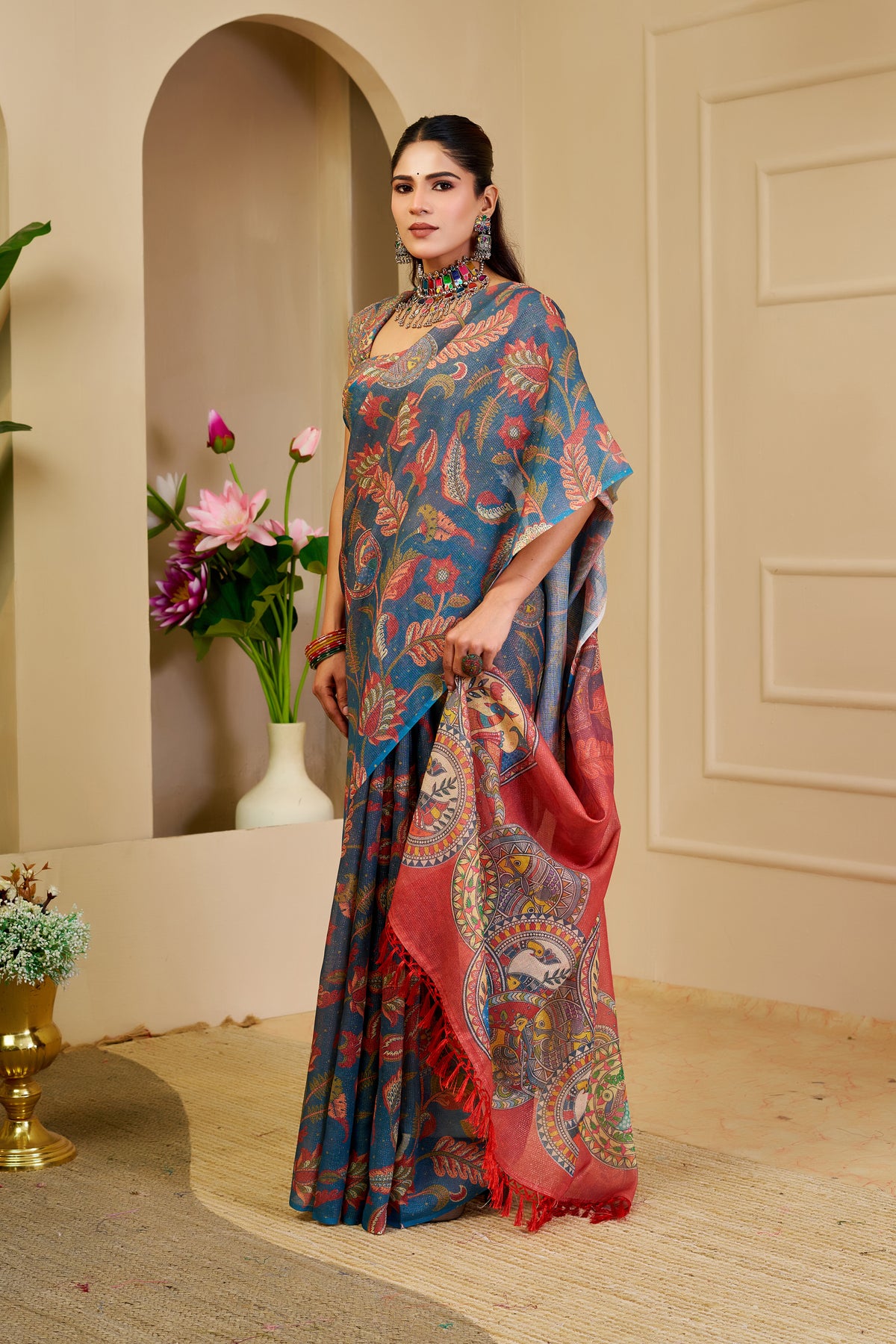 Teal Blue Tissue Silk Saree with Multicolour Floral Motifs, Coral Red Printed Pallu and Running Blouse for Festive Wear