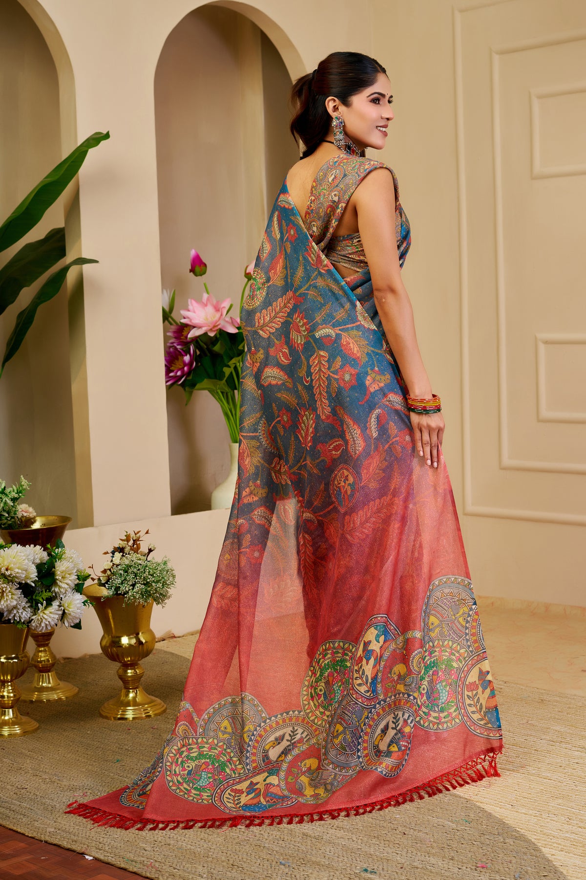 Teal Blue Tissue Silk Saree with Multicolour Floral Motifs, Coral Red Printed Pallu and Running Blouse for Festive Wear