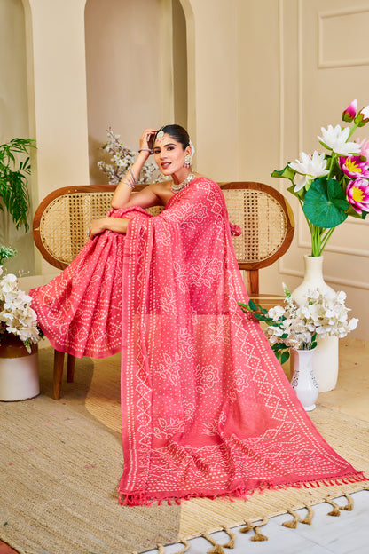 Coral Pink Tissue Silk Saree with Bandhani-Inspired Floral Motifs and Tasselled Pallu for Festive Wear with Running Blouse