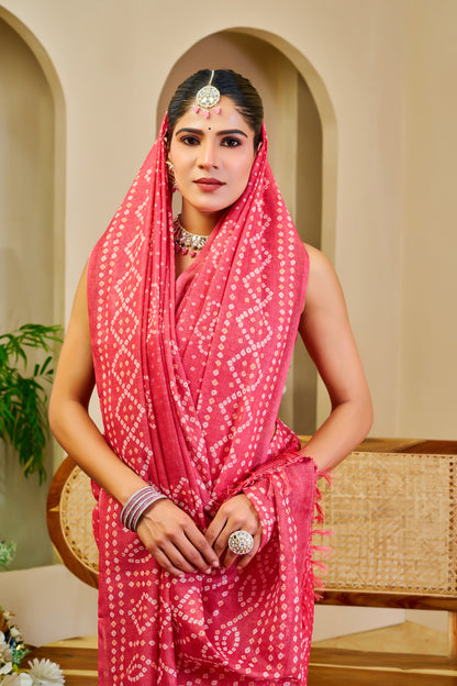 Coral Pink Tissue Silk Saree with Bandhani-Inspired Floral Motifs and Tasselled Pallu for Festive Wear with Running Blouse