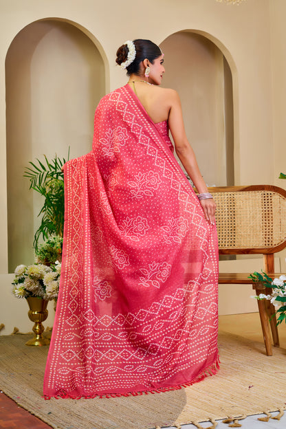 Coral Pink Tissue Silk Saree with Bandhani-Inspired Floral Motifs and Tasselled Pallu for Festive Wear with Running Blouse