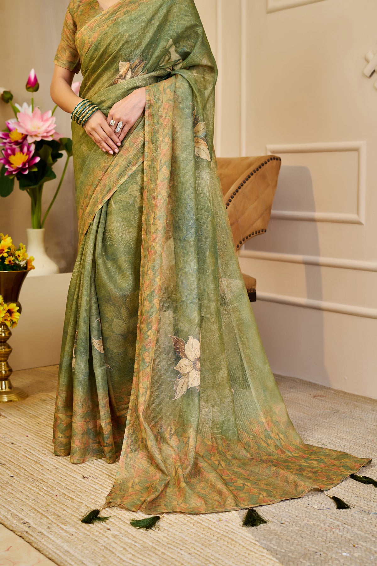 Olive Green Tissue Silk Saree with Floral Motifs, Tassel Pallu and Running Blouse for Festive Occasions | Swaraas
