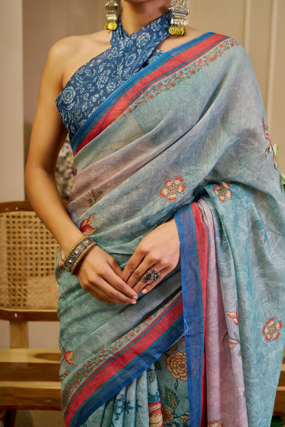 Sea Green Tissue Silk Saree with Floral Motifs, Pink and Blue Border & Running Blouse for Festive Occasions