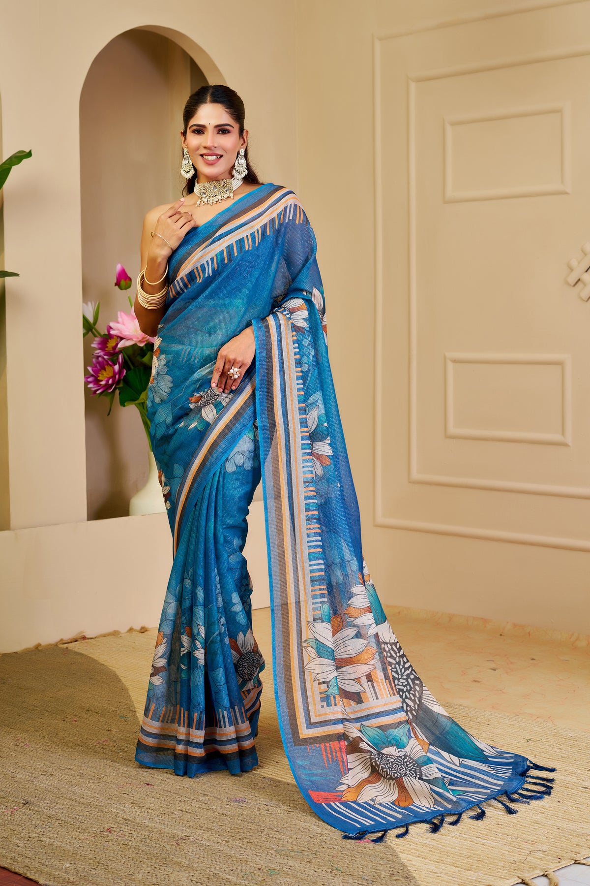 Peacock Blue Tissue Silk Saree with Floral Design, Striped Border and Running Blouse for Festive Occasions | Swaraas
