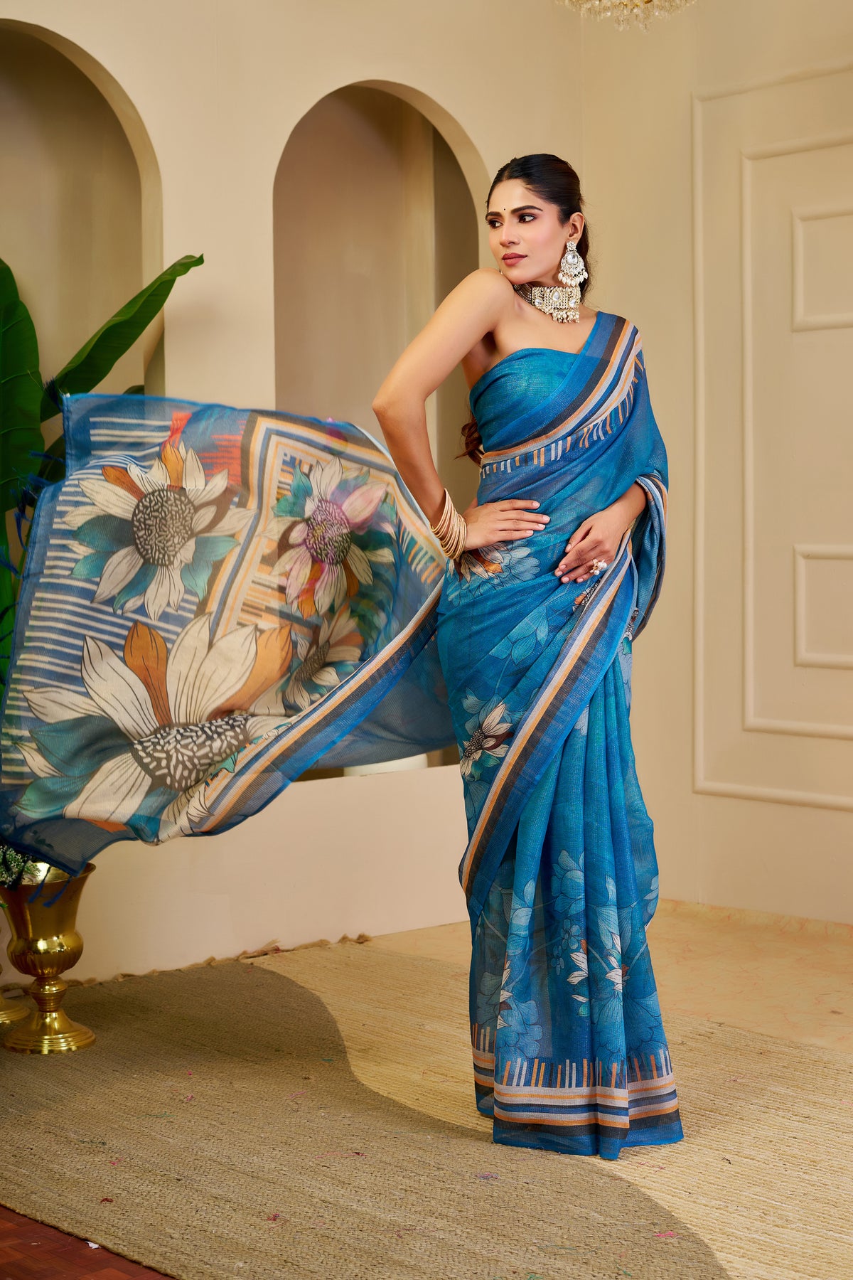 Peacock Blue Tissue Silk Saree with Floral Design, Striped Border and Running Blouse for Festive Occasions | Swaraas