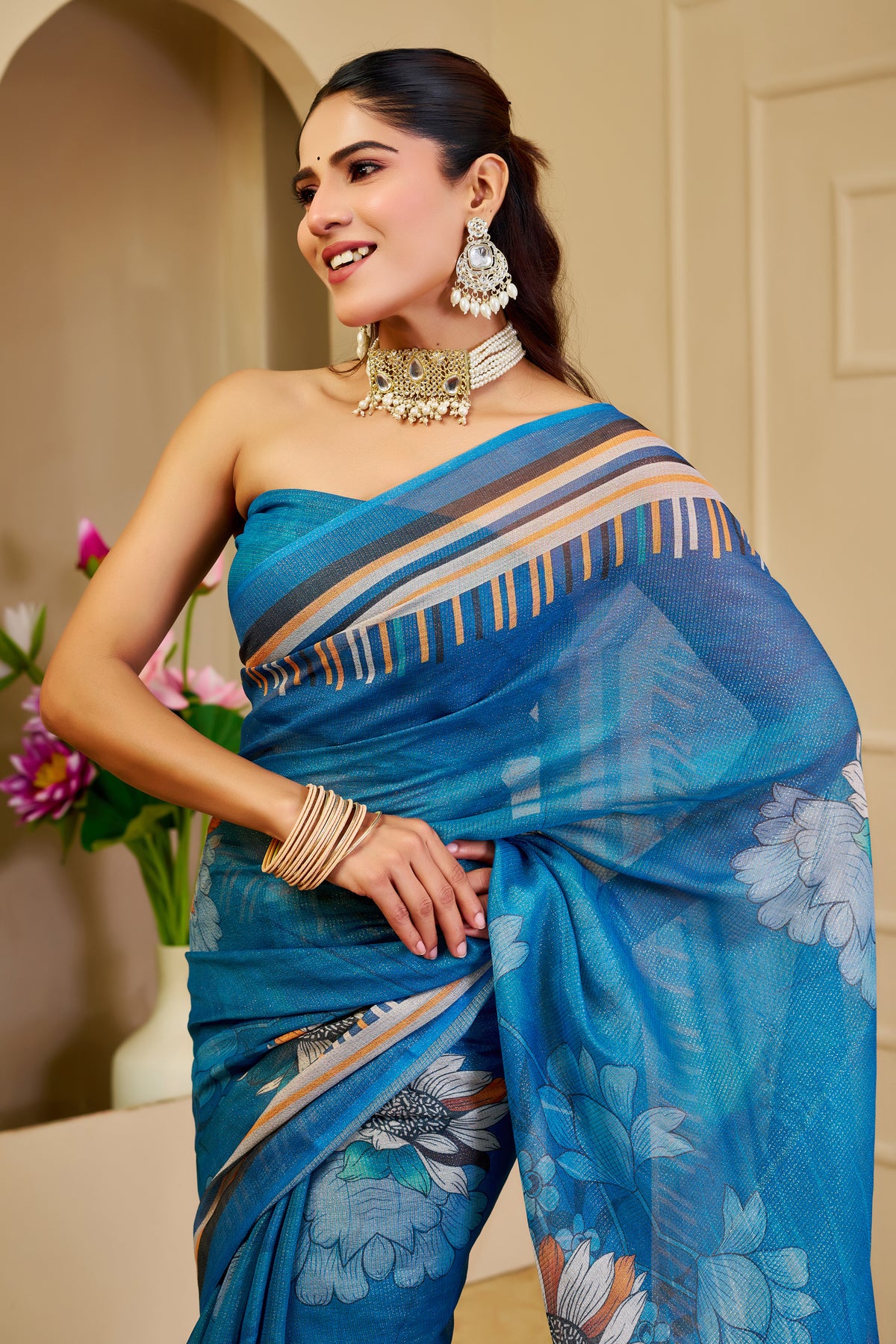 Peacock Blue Tissue Silk Saree with Floral Design, Striped Border and Running Blouse for Festive Occasions | Swaraas