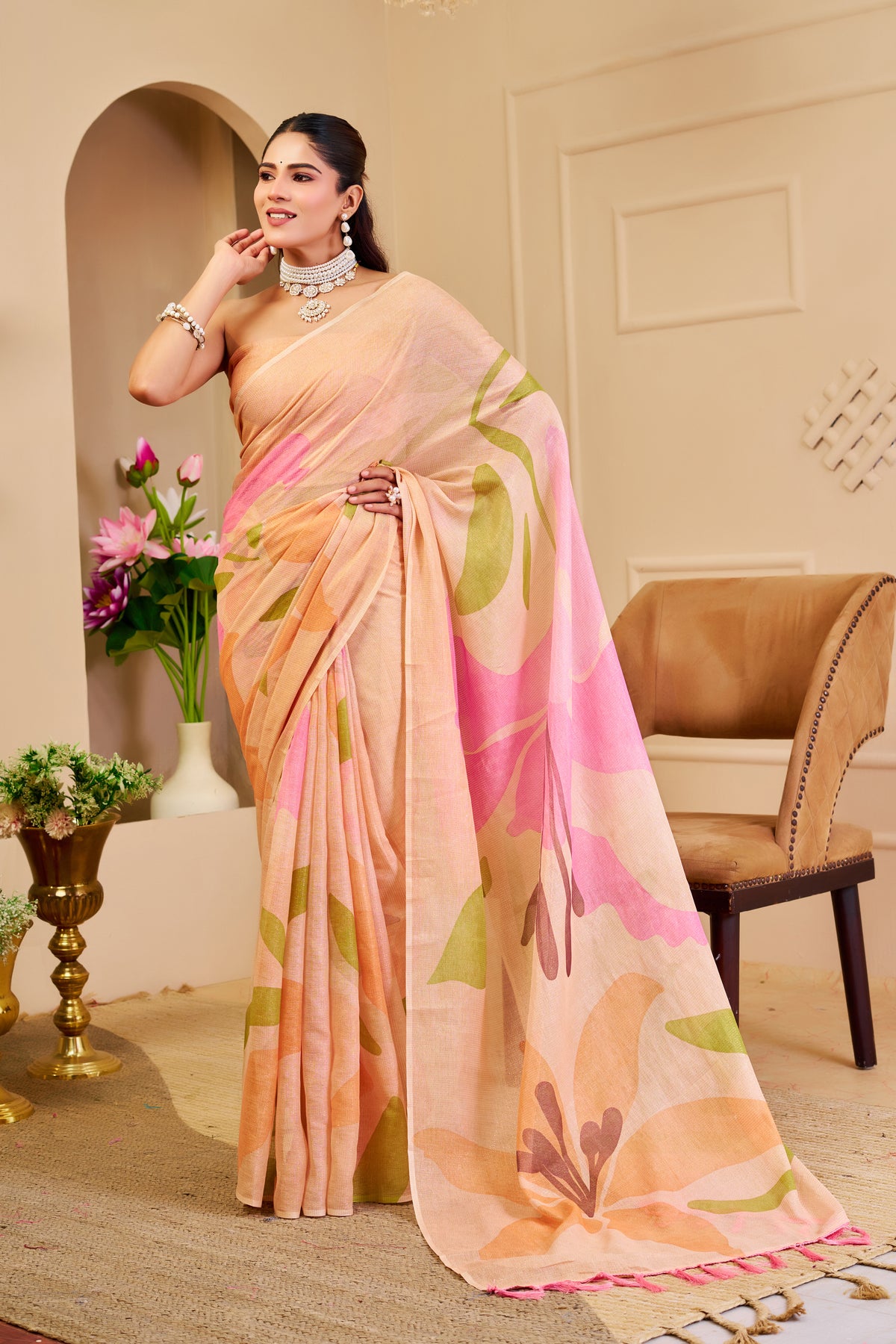 Peach Tissue Silk Saree with Pink and Green Floral Design, Tasselled Pallu and Running Blouse for Festive Wear