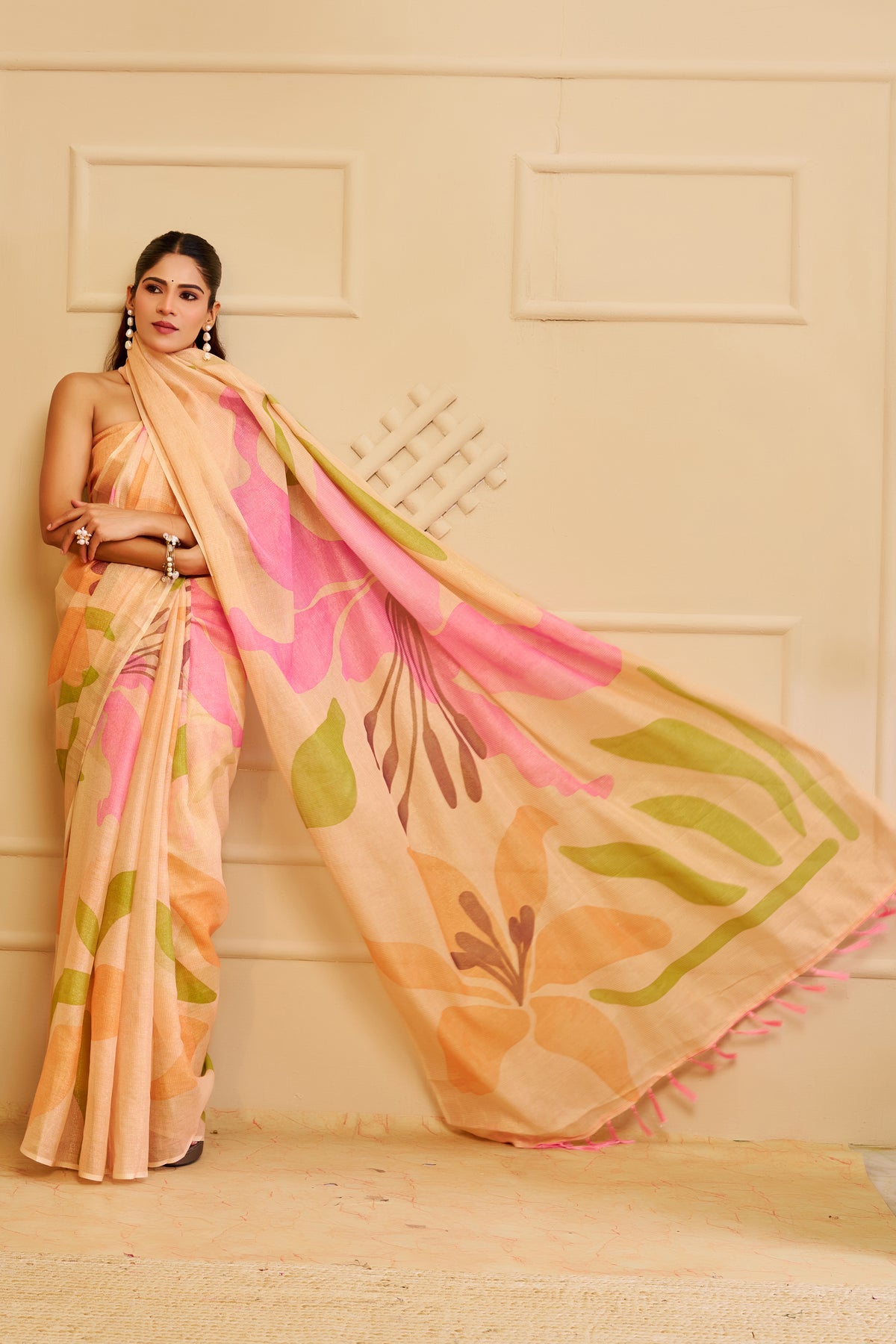 Peach Tissue Silk Saree with Pink and Green Floral Design, Tasselled Pallu and Running Blouse for Festive Wear