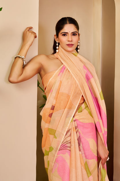 Peach Tissue Silk Saree with Pink and Green Floral Design, Tasselled Pallu and Running Blouse for Festive Wear