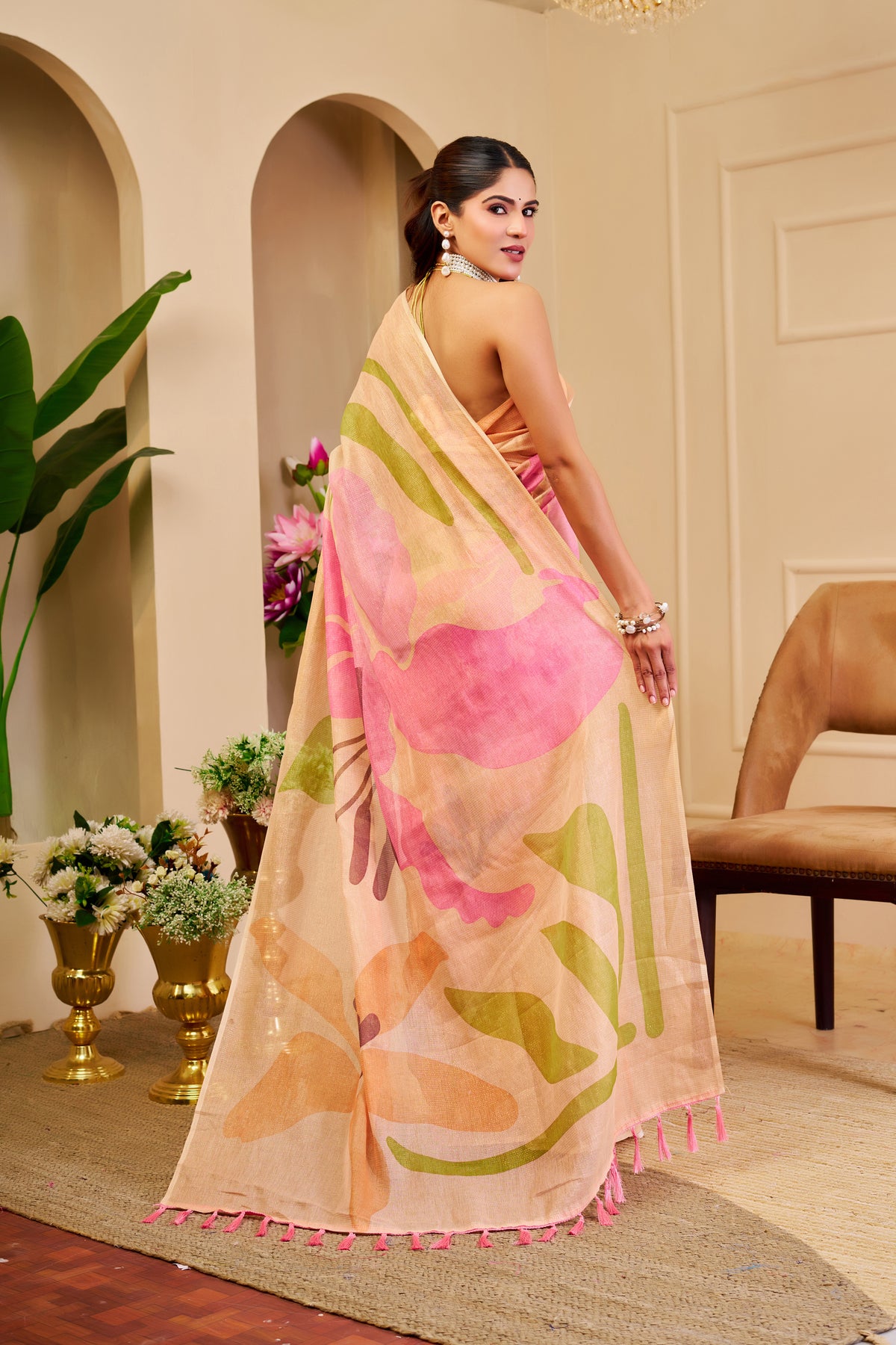 Peach Tissue Silk Saree with Pink and Green Floral Design, Tasselled Pallu and Running Blouse for Festive Wear