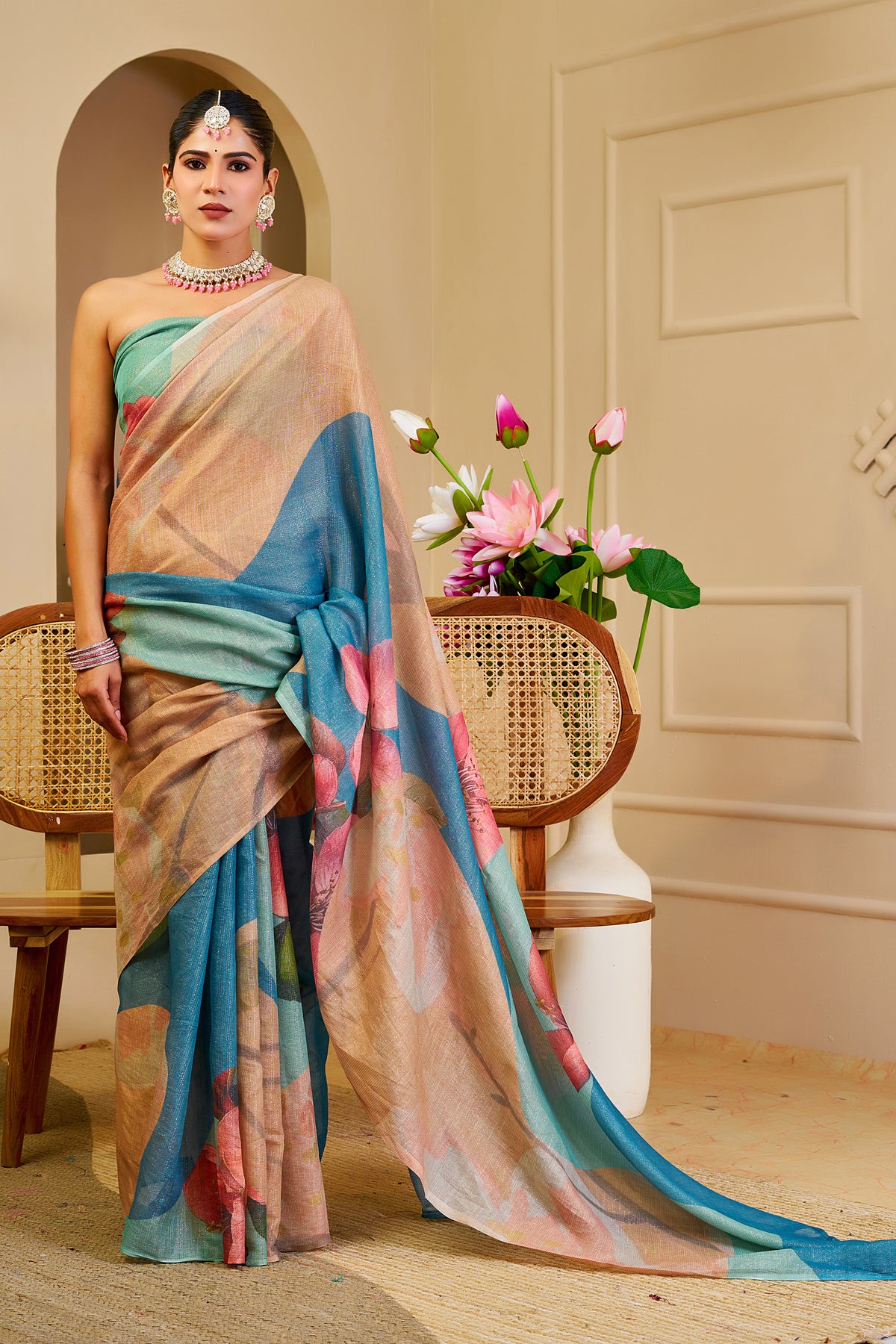 Beige and Teal Blue Tissue Silk Saree with Pink Floral Print, Tassel Pallu and Running Blouse for Festive Occasions