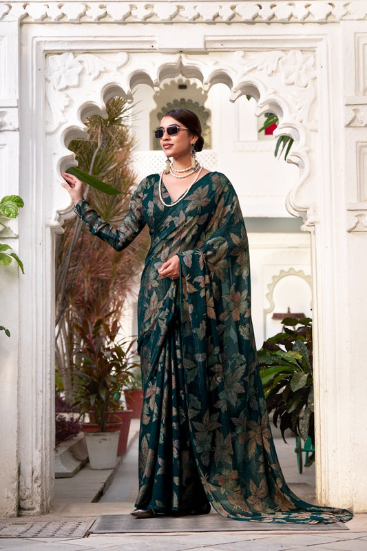 This floral Lurex Brasso saree blends the charm of blooming prints with the luxury of subtle shine