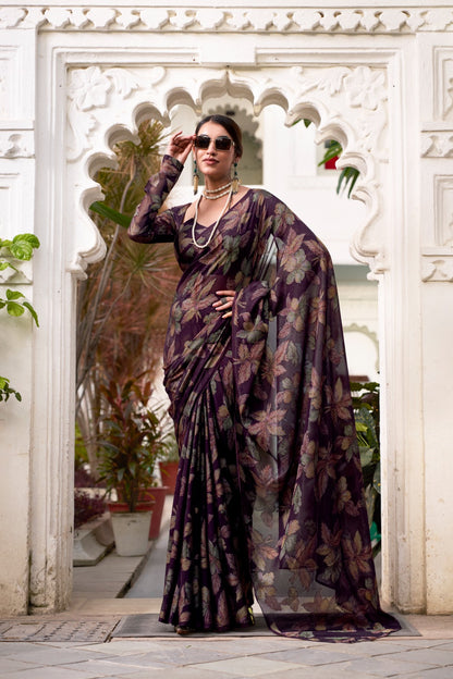 This floral Lurex Brasso saree blends the charm of blooming prints with the luxury of subtle shine