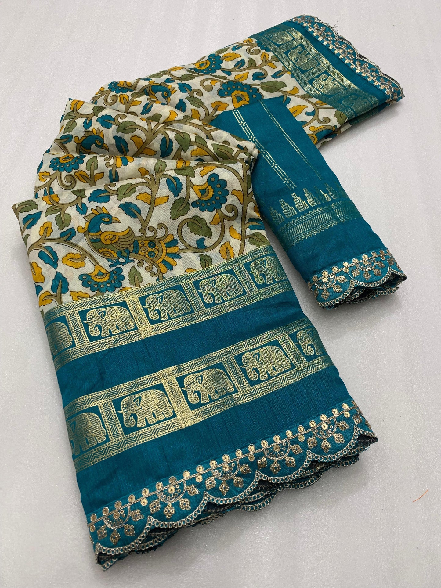 New dola silk saree with kalamkari foil print and magam sequence work lace