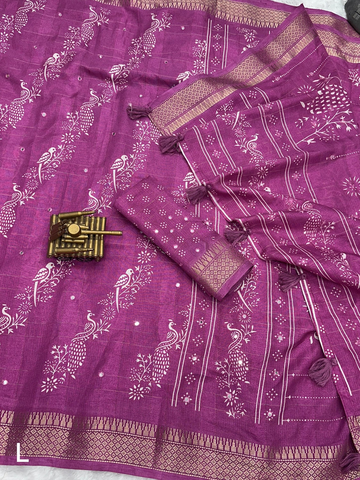 Kalamkari printed saree with zari weaving, & paper mirror work and tussles in pallu