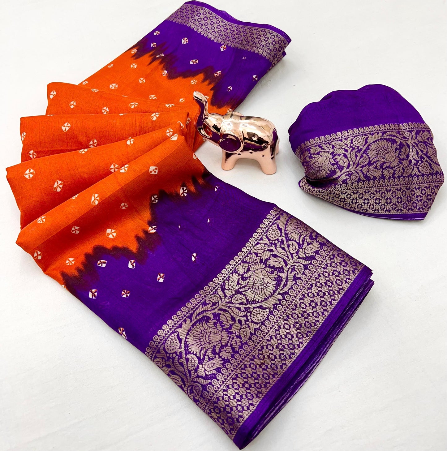 Soft dola silk saree with beauitful bandhini print and jacquard woven border
