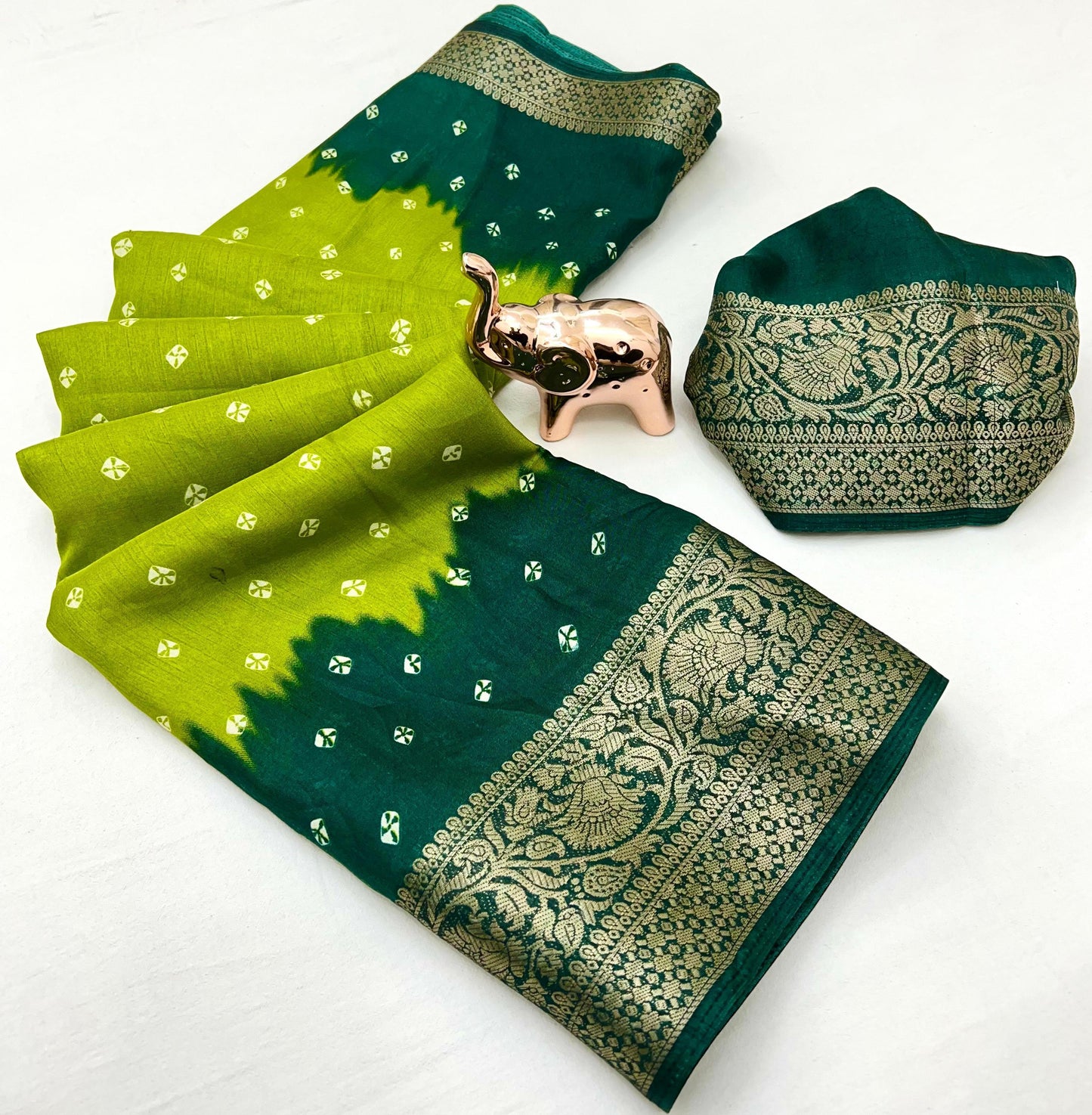 Soft dola silk saree with beauitful bandhini print and jacquard woven border