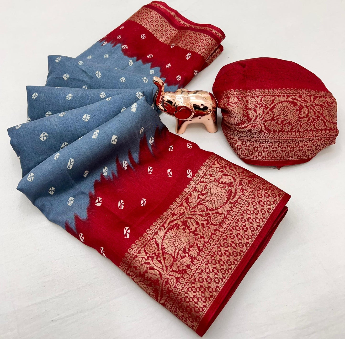Soft dola silk saree with beauitful bandhini print and jacquard woven border