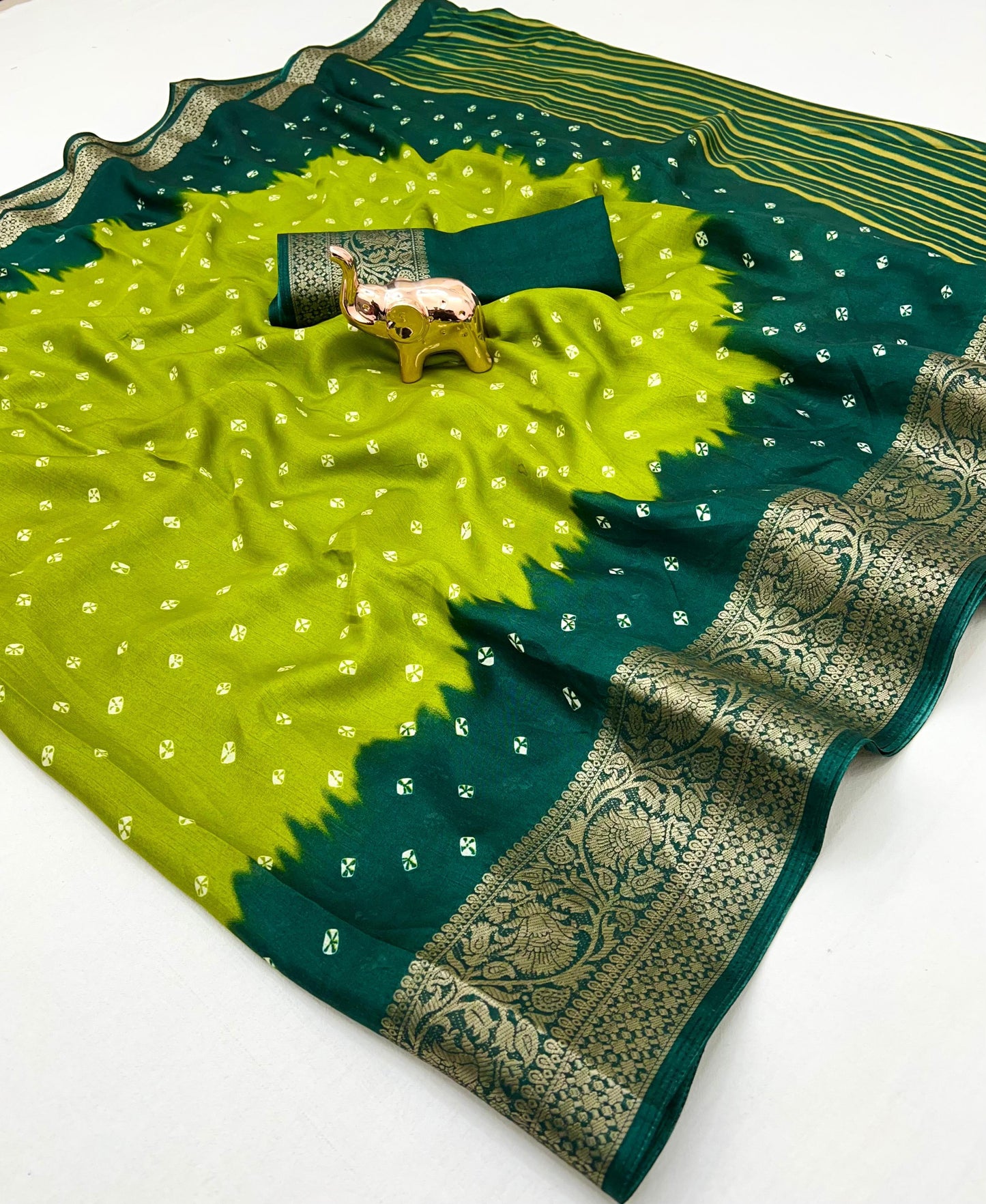 Soft dola silk saree with beauitful bandhini print and jacquard woven border