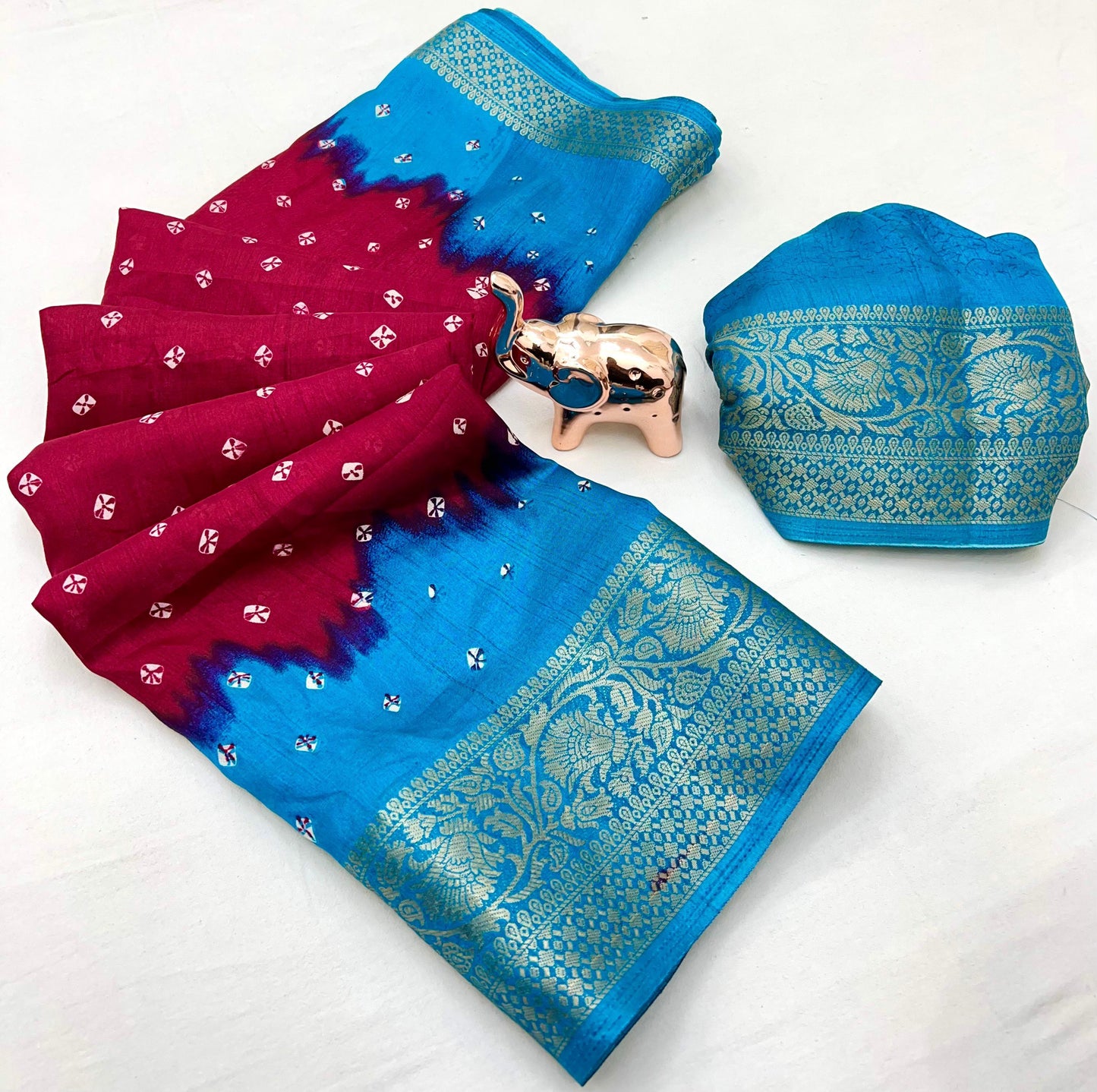 Soft dola silk saree with beauitful bandhini print and jacquard woven border