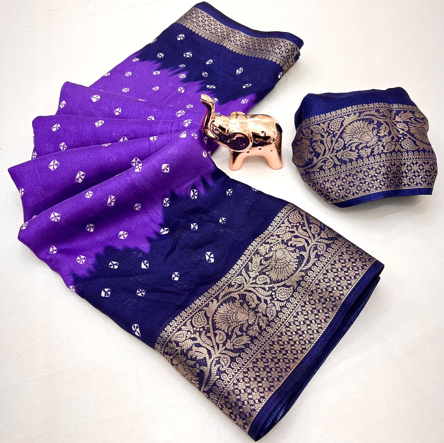 Soft dola silk saree with beauitful bandhini print and jacquard woven border