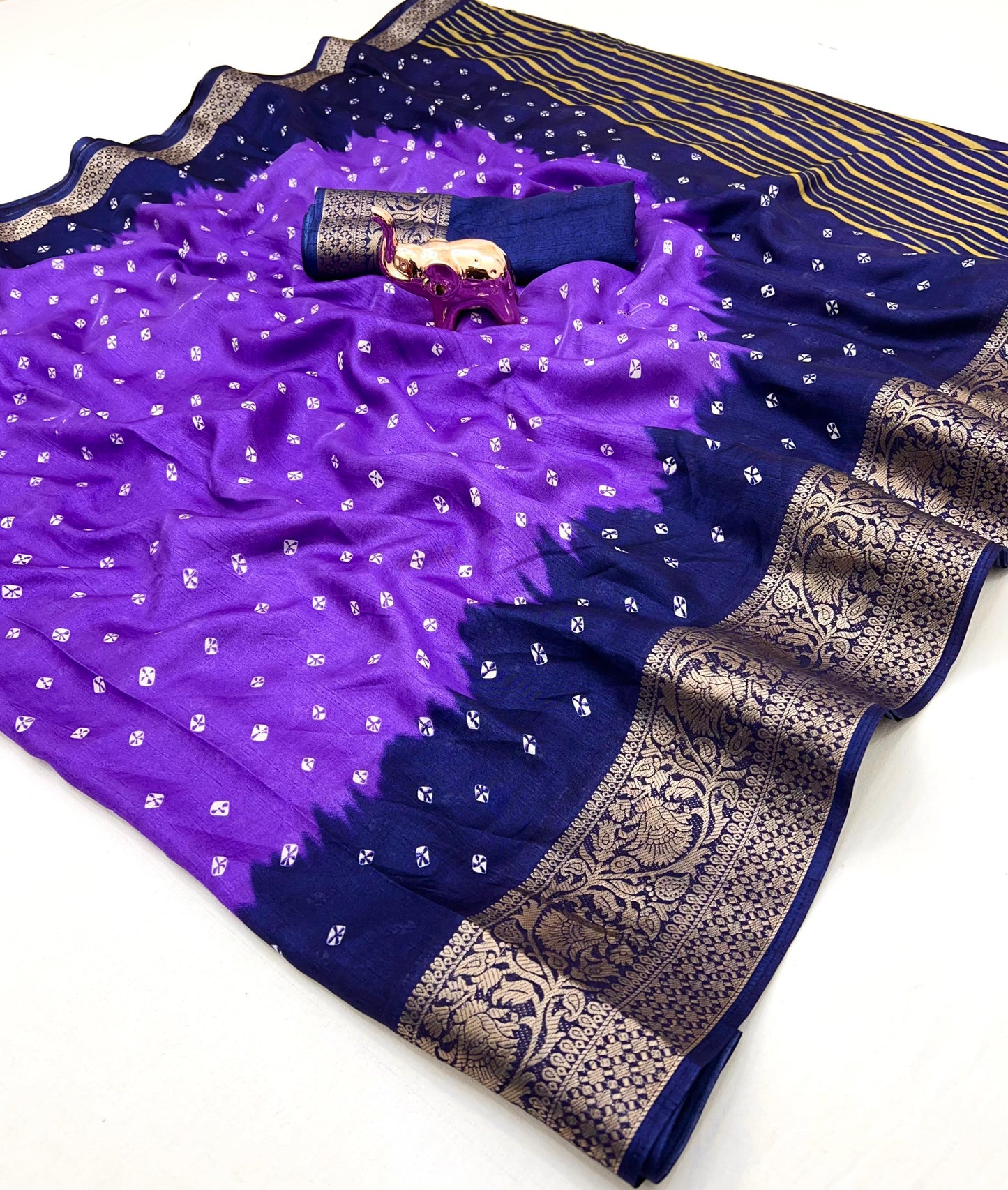 Soft dola silk saree with beauitful bandhini print and jacquard woven border