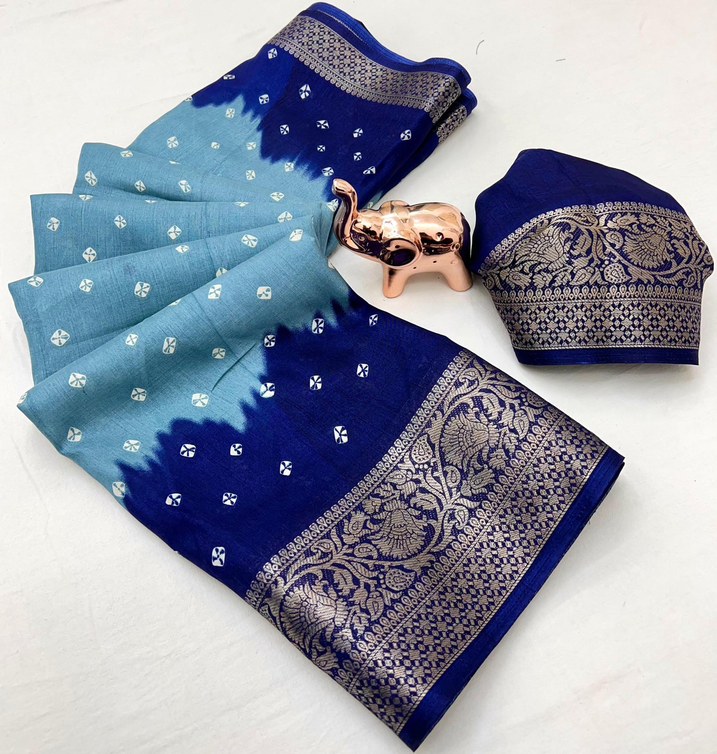 Soft dola silk saree with beauitful bandhini print and jacquard woven border