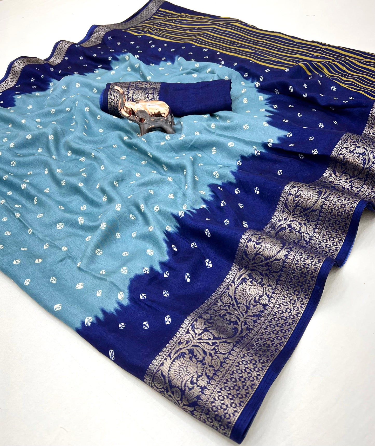 Soft dola silk saree with beauitful bandhini print and jacquard woven border