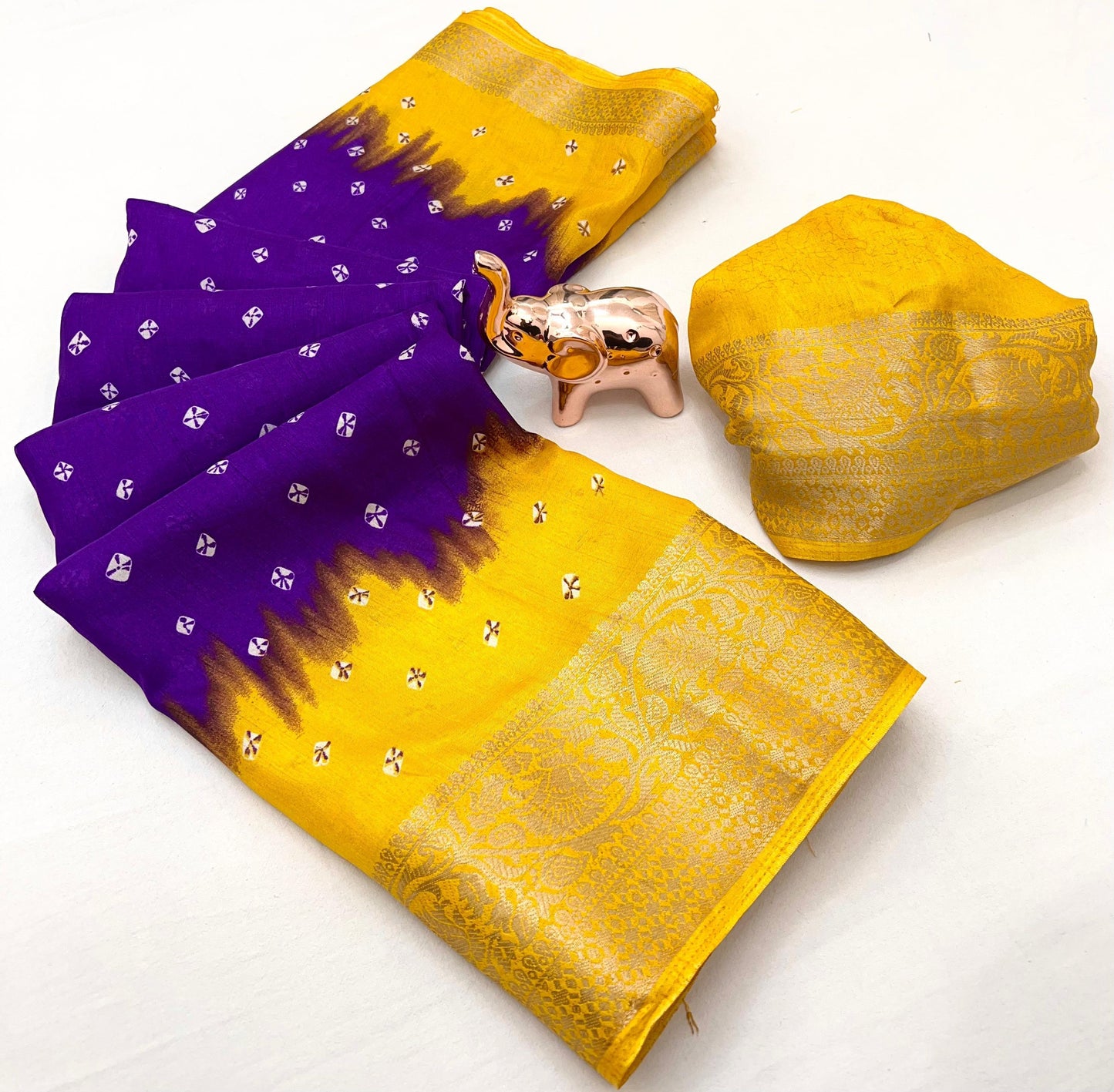 Soft dola silk saree with beauitful bandhini print and jacquard woven border