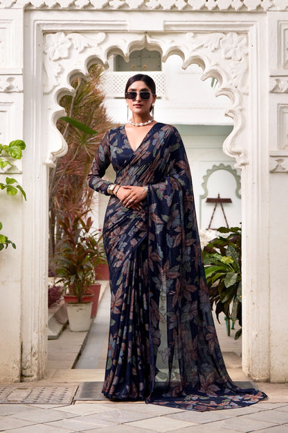 This floral Lurex Brasso saree blends the charm of blooming prints with the luxury of subtle shine