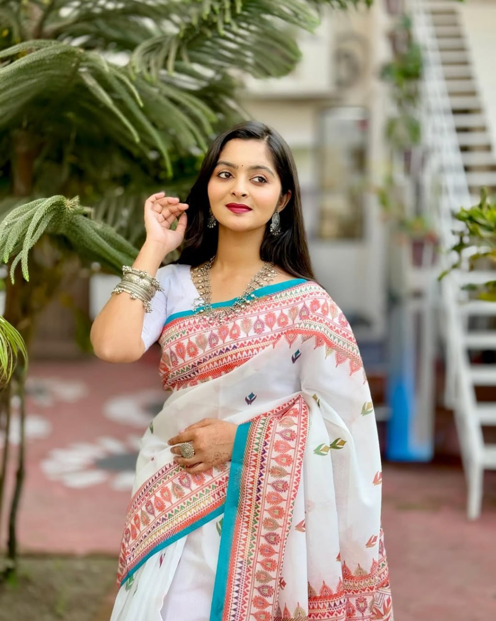Ivory White Linen Saree with Coral Pink Printed Border & Turquoise Edging, Multicolour Motifs and Running Blouse