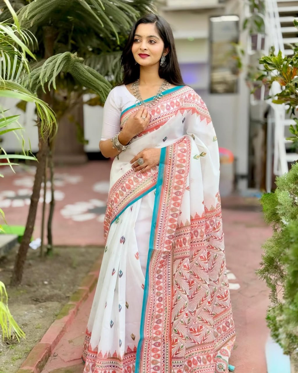 Ivory White Linen Saree with Coral Pink Printed Border & Turquoise Edging, Multicolour Motifs and Running Blouse
