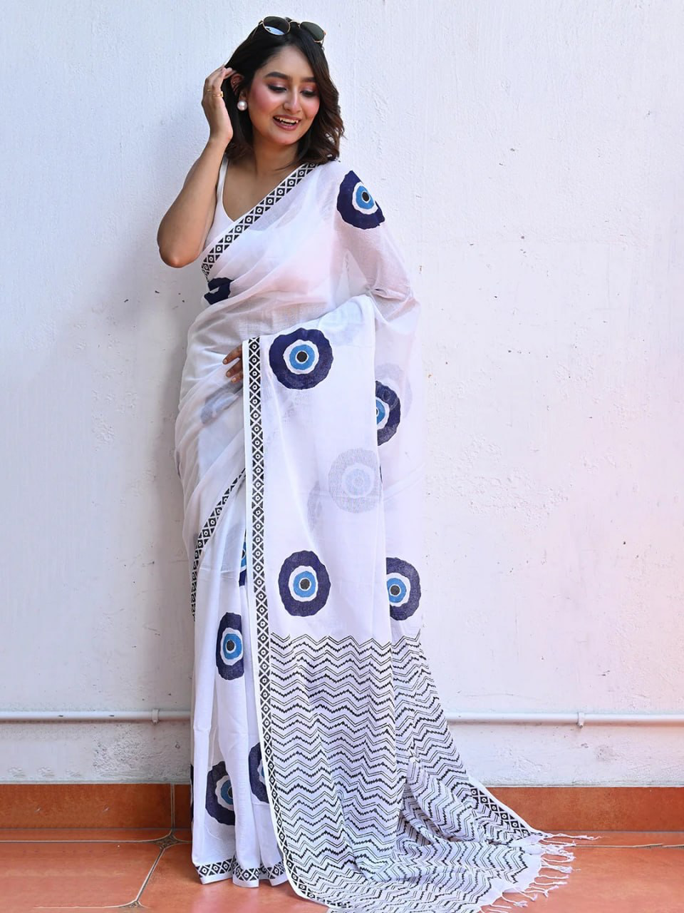 White Linen Saree with Blue Evil Eye Motifs, Geometric Border and Chevron Pallu with Running Blouse for Office Wear