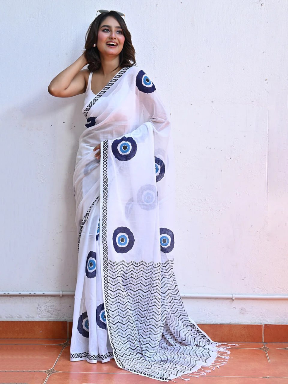 White Linen Saree with Blue Evil Eye Motifs, Geometric Border and Chevron Pallu with Running Blouse for Office Wear