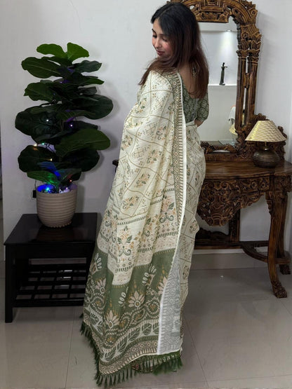 Cream and olive green linen block print saree - back view