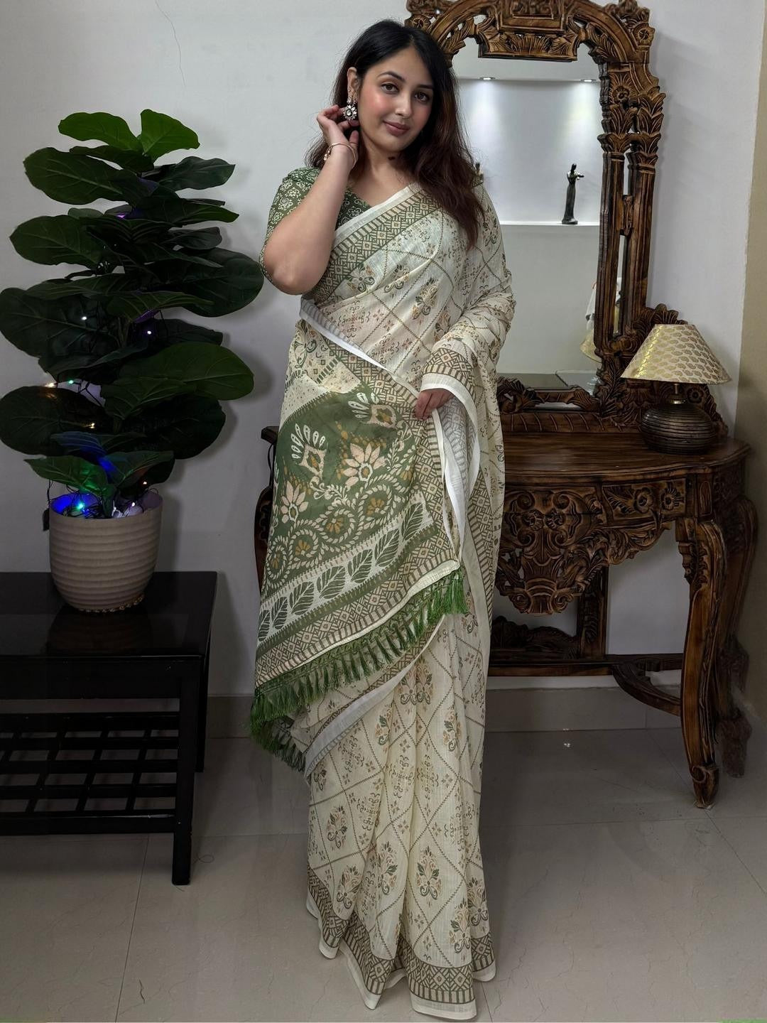 Cream and olive green linen block print saree - drape view