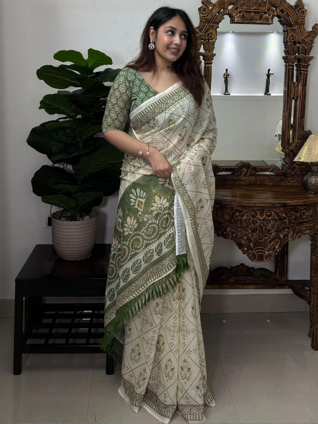 Cream and olive green linen block print saree - border tassel detail