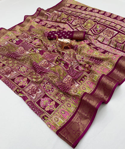 Ivory Dola silk saree spread showing multicolour motifs and gold-tone border