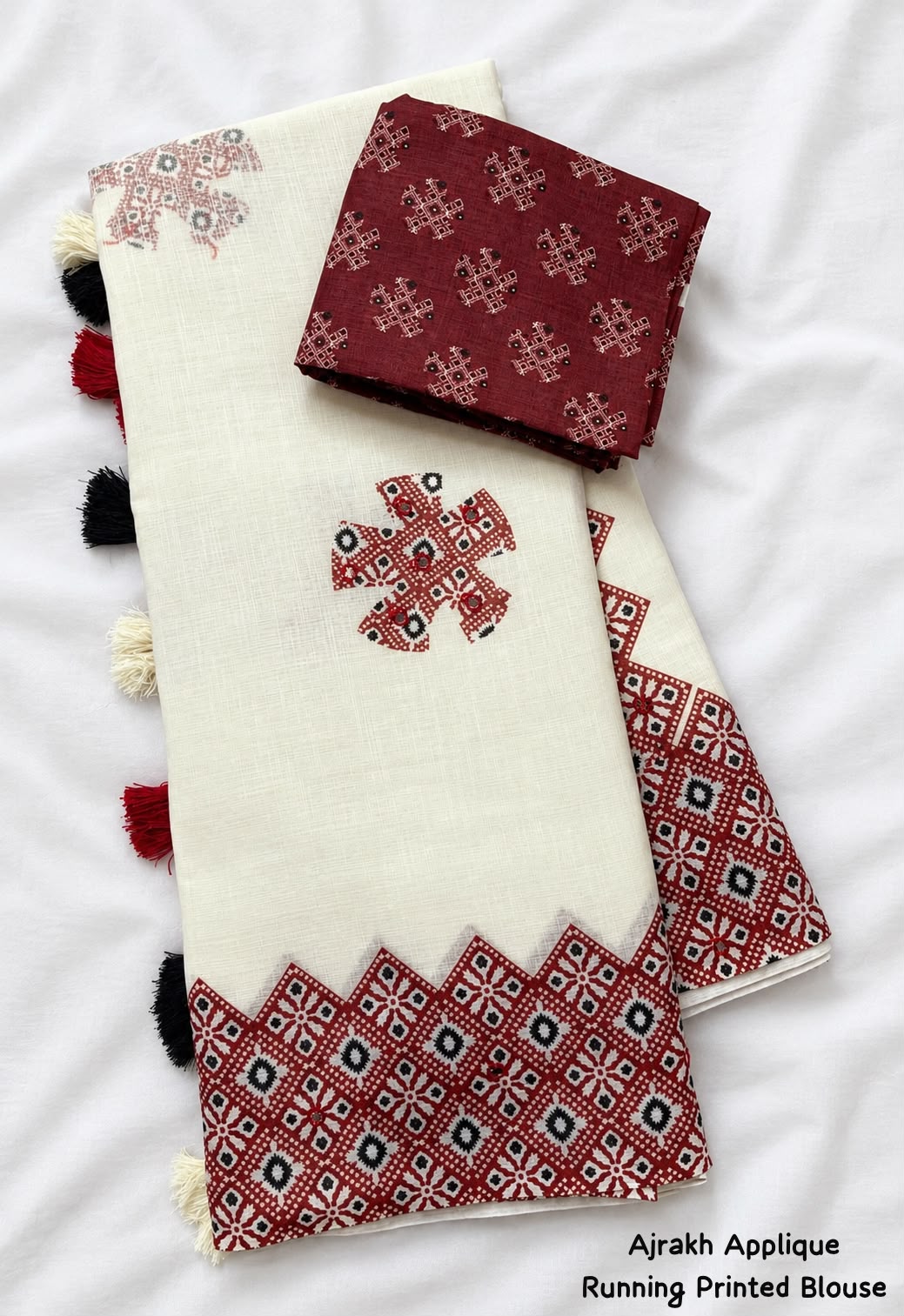 Ivory and Maroon Soft Linen Cotton Saree with Geometric Motifs, Statement Border, Tassels and Running Printed Blouse