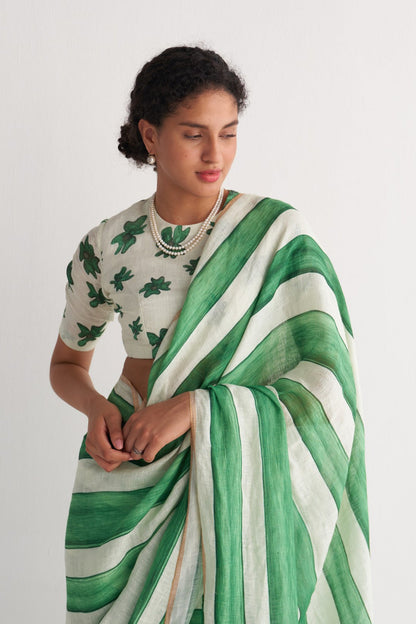 Emerald green and ivory striped linen saree - fabric close up